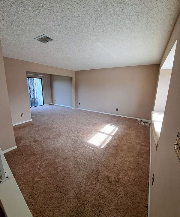 Living room / Dining room combo with half bath