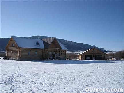 Beautiful custom log home on 20 acres