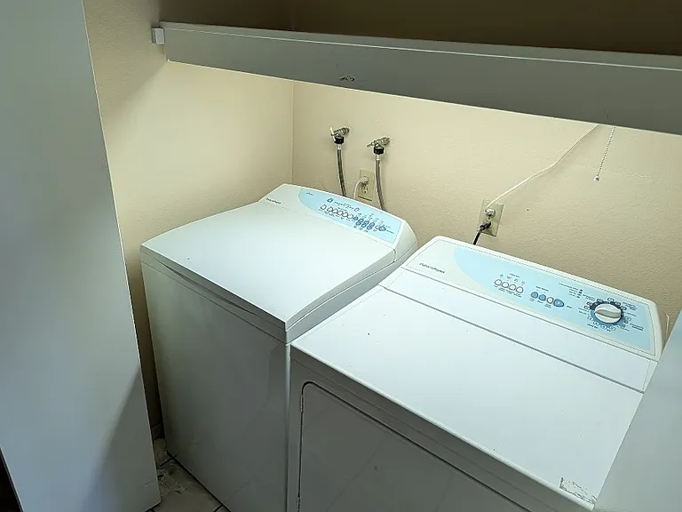 Laundry room with washer and dryer