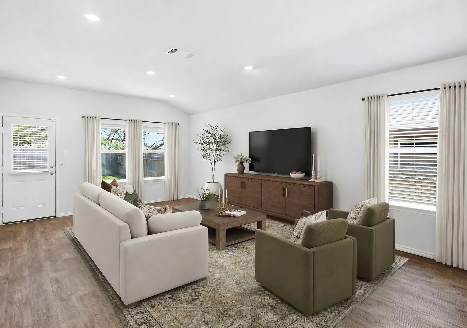 Open-Concept Living with Island Kitchen and Refrigerator Included — Photo 2