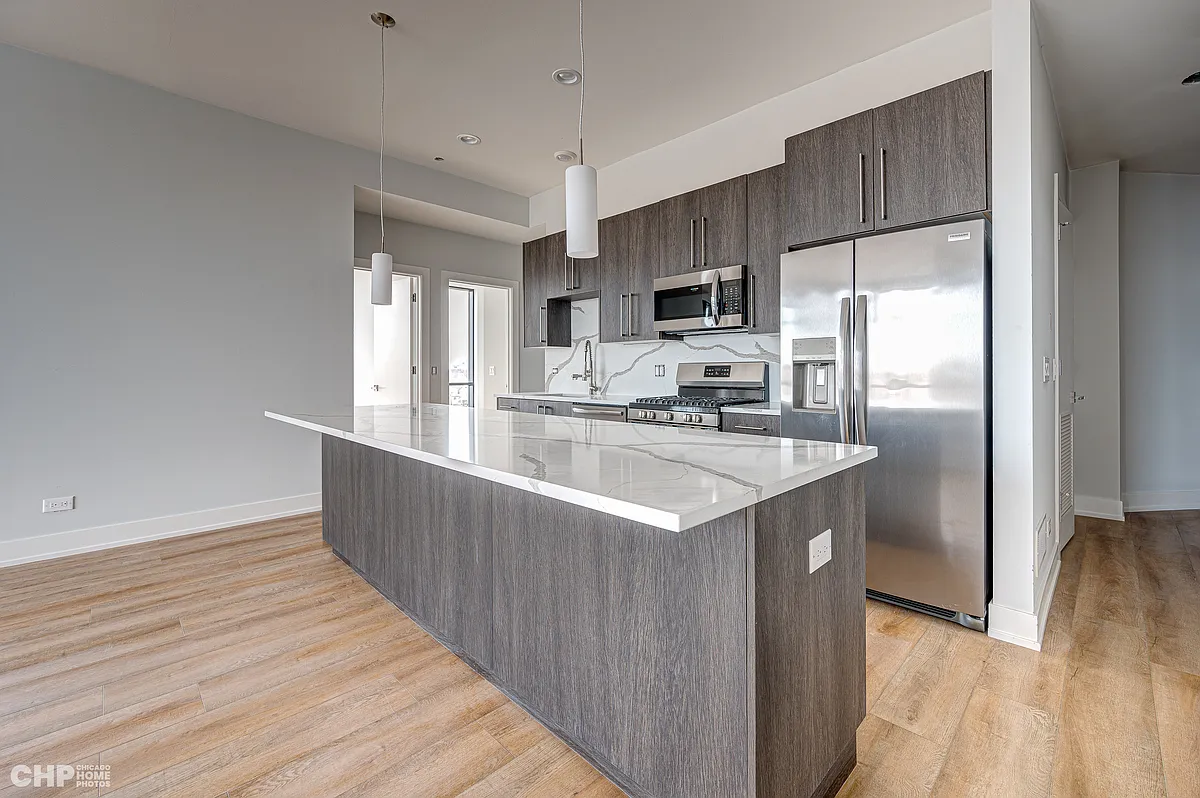 Building Photo - 3114 N Ridgeway Ave #307