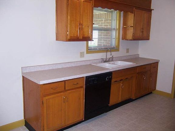 Oversized, newly remodeled, eat-in-kitchen has plenty of counter space.