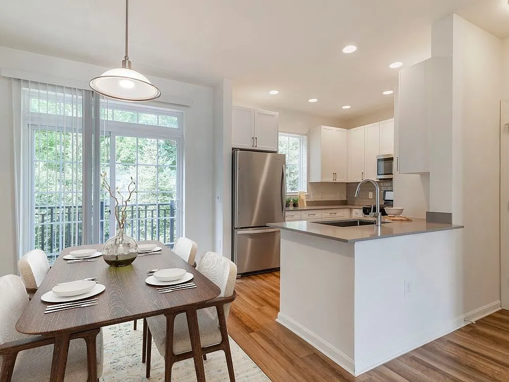 Renovated Package II kitchen and dining area with hard surface flooring - Avalon Northborough