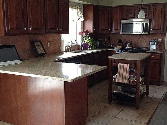 Cherry cabinets w/ granite