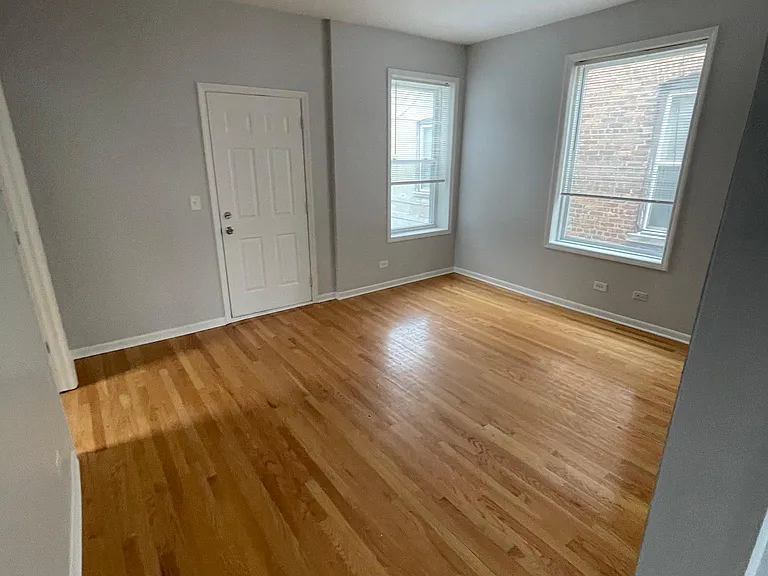 Living Room with hardwood flooring, Main entry.
