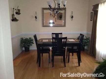 Dining Room
						:
						Open to kitchen and living room