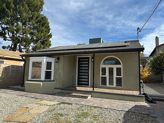 front of house with solar panels