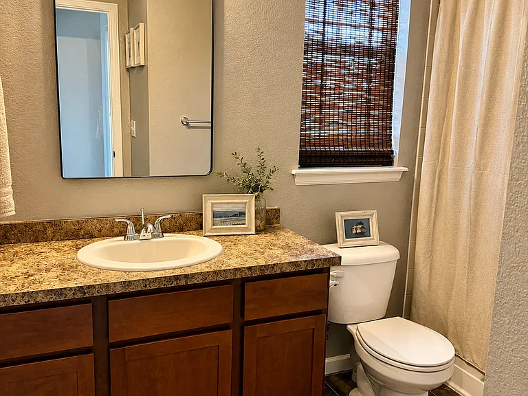 full guest bathroom on second floor with full bathtub