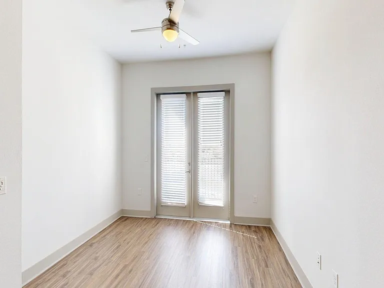 Apartment Living Room with Wood Style Floor and Patio/Balcony.