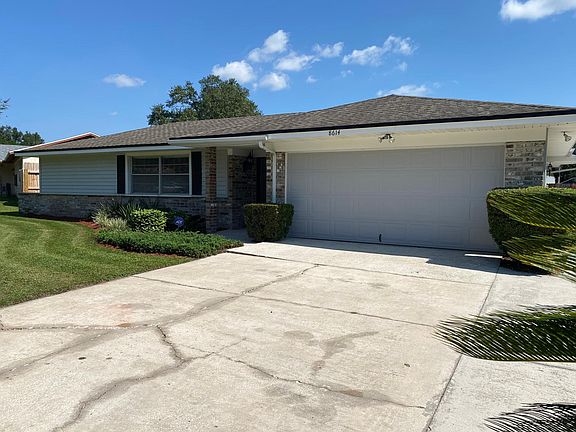 Two Car Garage with extra space for laundry area