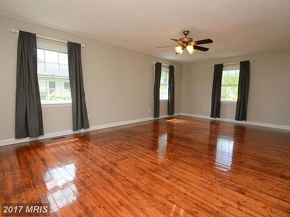 Home boasts authentic rustic hardwood flooring