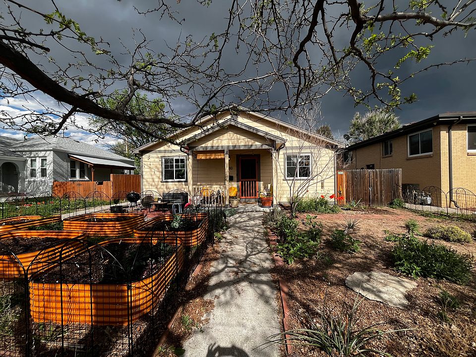 Xeric front garden and raised vegetable beds
