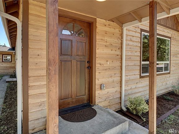 New cedar siding with clear coat.