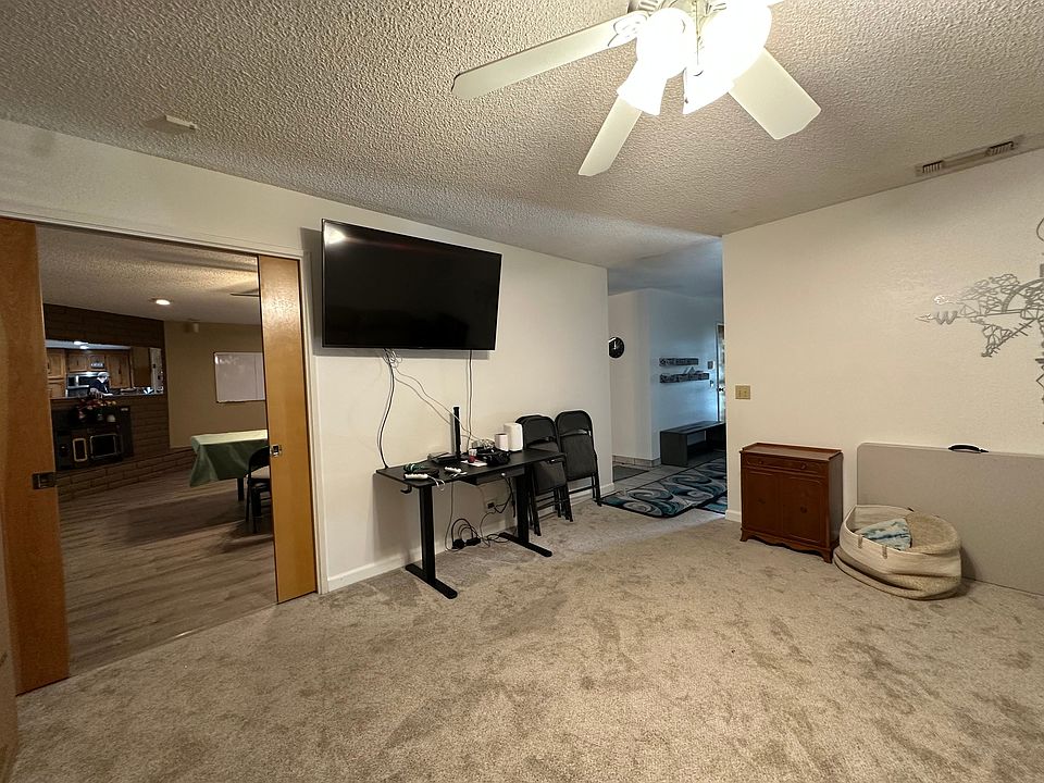 Back to the couch facing the dinning room and entryway