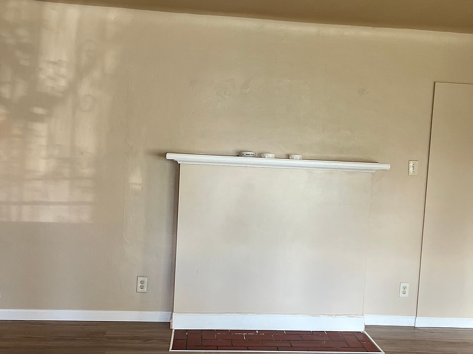 Large living room with new flooring.