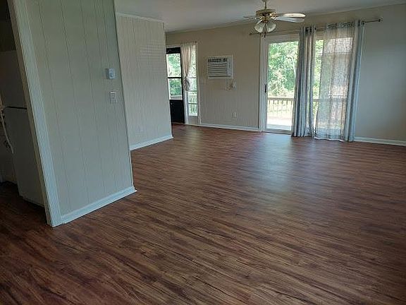 View from Dining Area toward Living Room and Front Door.