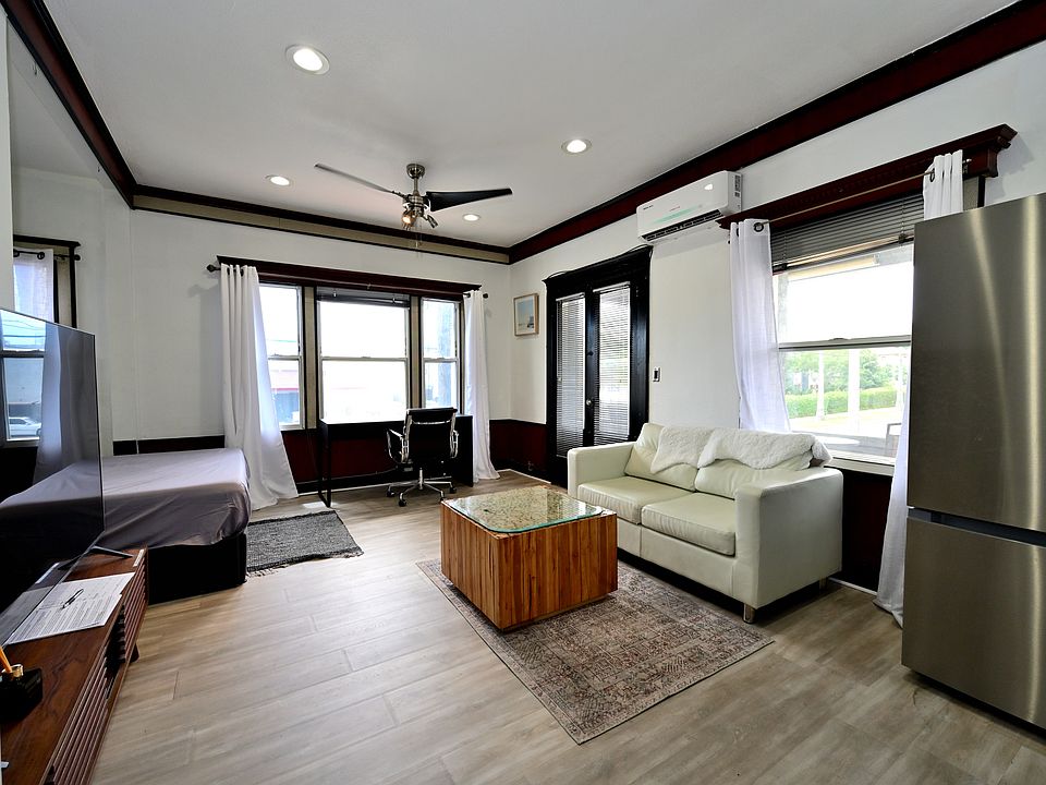 SUPERB VALUE! Fully Upgraded + Furnished LARGE Studio with many windows and private balcony