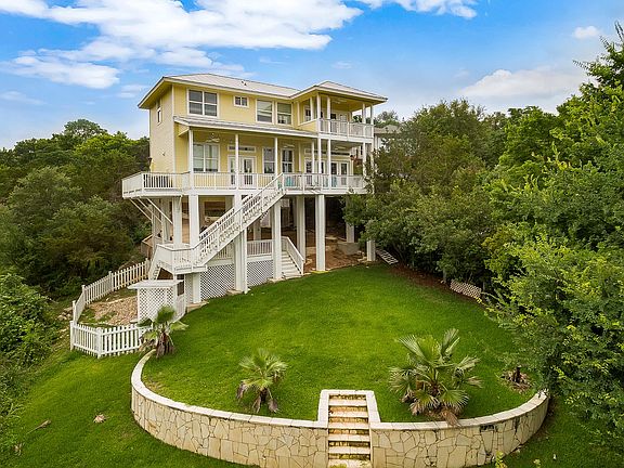 Gently sloping lawn to the water