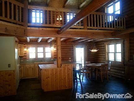 Enter into open area with cathedral ceiling
