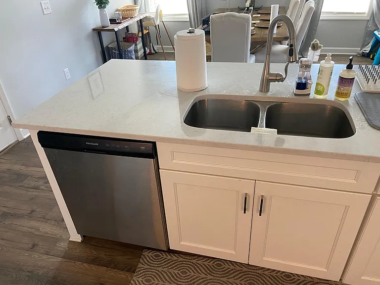 Double sink, dishwasher, cabinets