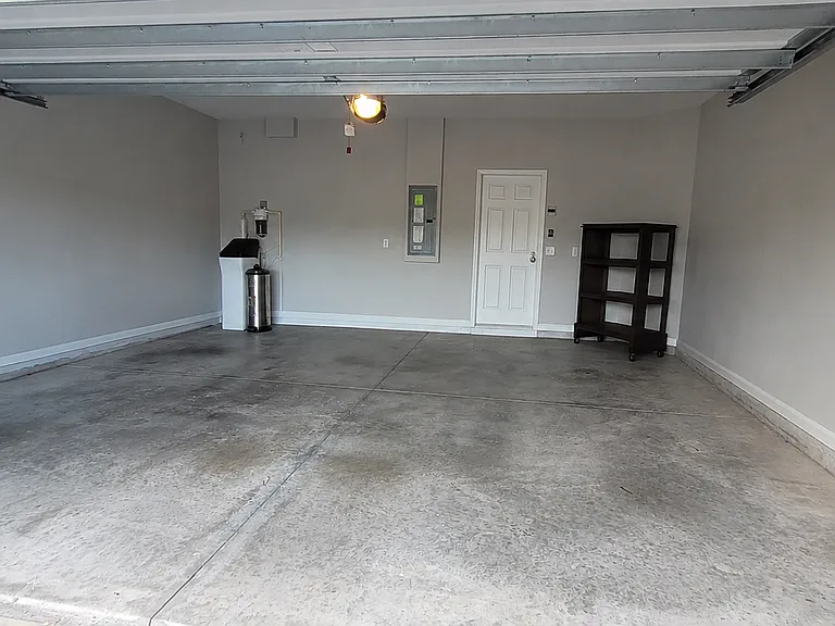 2 Car Garage freshly repainted with modern color and watersoftner ready