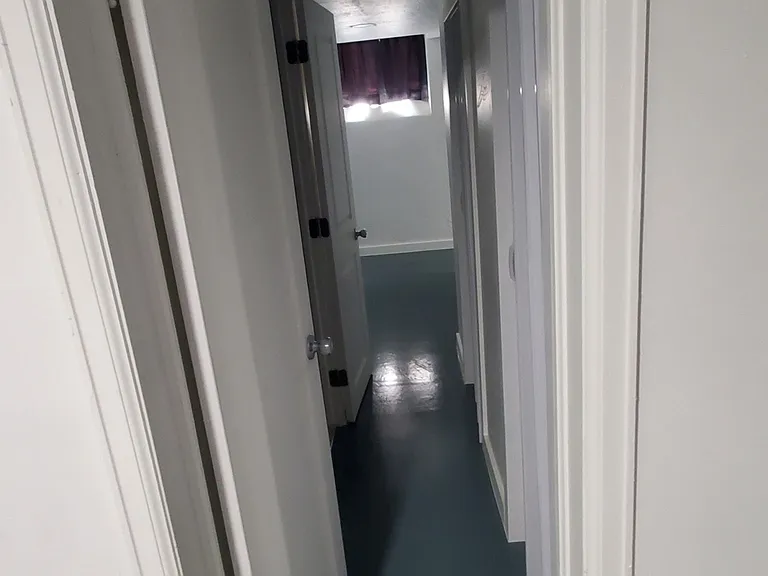Basement Hallway between Laundry room and Bathroom