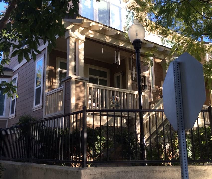 Front facade of townhome showing Craftsman style architectur