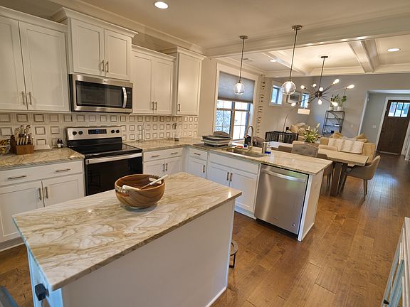 Kitchen view of Dining Room & Living Room on main level