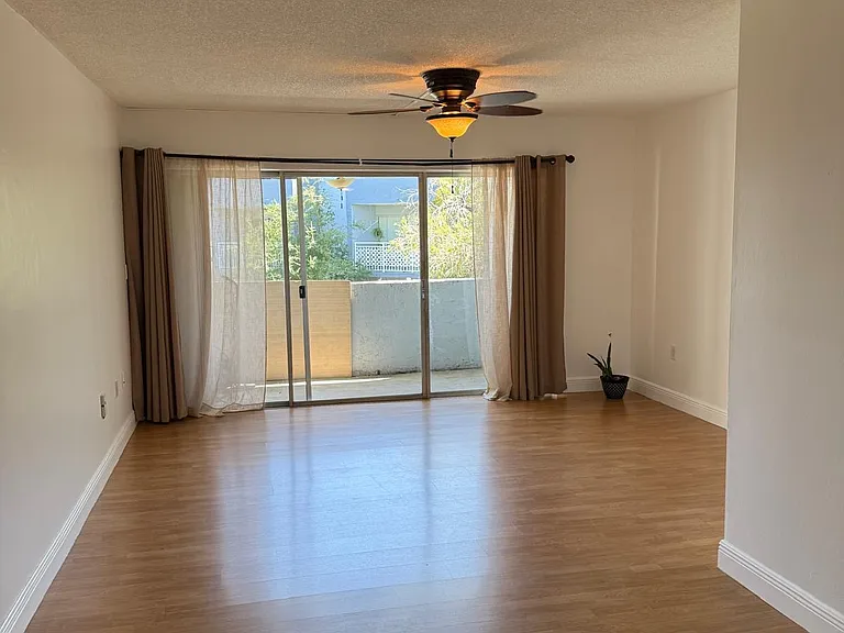 Living room with first balcony