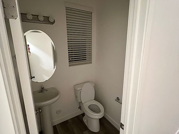 Half bath located on the main floor next to the laundry room.