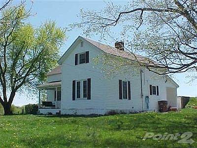 This is a view of the front and right side of the home.