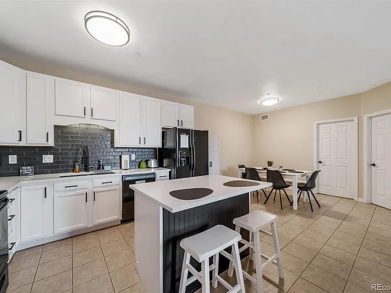 7292 S Blackhawk St #203 — Photo 10