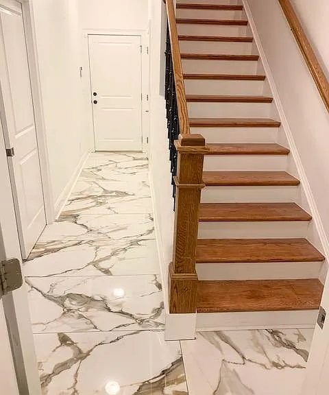 Basement Stairs to Garage and Driveway