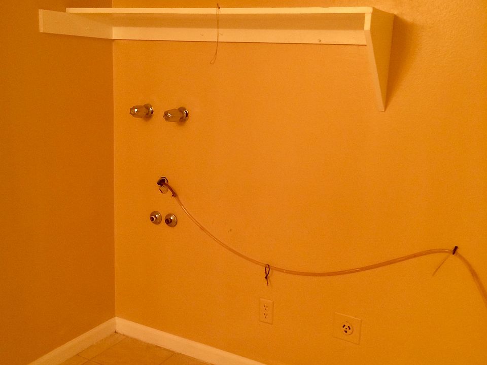 laundry area in bathroom