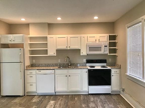 Kitchen remodel with gorgeous floors and quartz countertops.