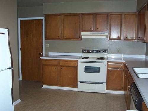 Very large Kitchen has since been updated w fridge & stove. Ton of counter space and storage!