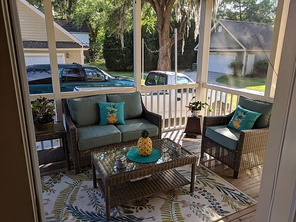 Enjoy screened porch with ceiling
fan
