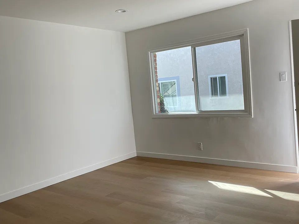 Living room. New vinyl plank flooring throughout.