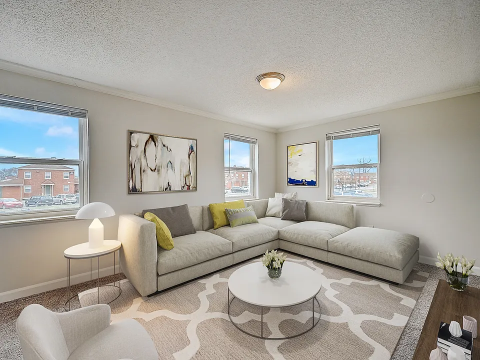 Recently Renovated Townhouse Style Apartments featuring New gray carpet, Neutral paint scheme, Premium hardwood-style flooring, Neutral paint scheme, Upgraded light fixtures, New cabinets, Matching stainless steel appliances, Washer/Dryer, Air conditionin