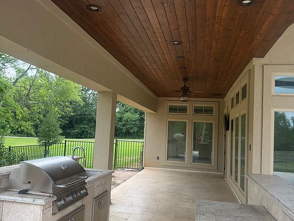 Outdoor kitchen with dining area