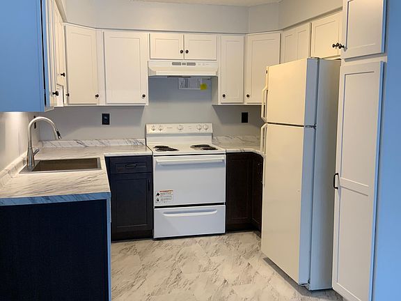 Cabinets just installed along with the lovely counters, floors, large double size stainless steel sink. Floor to ceiling pantry a long with turn table corner shelves. Micro wave and dishwasher is also included.