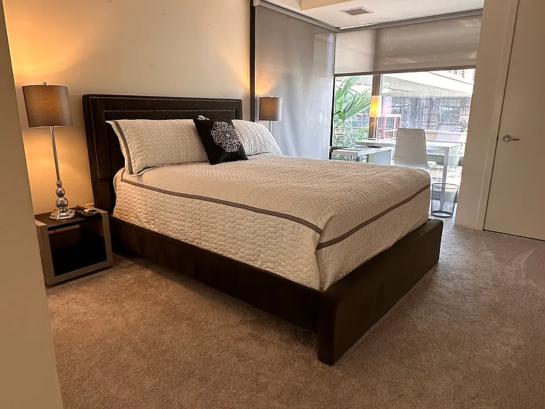 2nd bedroom - with adjustable desk and overlooks fountains