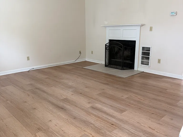Wood burning fireplace in living area