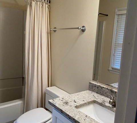 Master Bath with tub and granite counter
