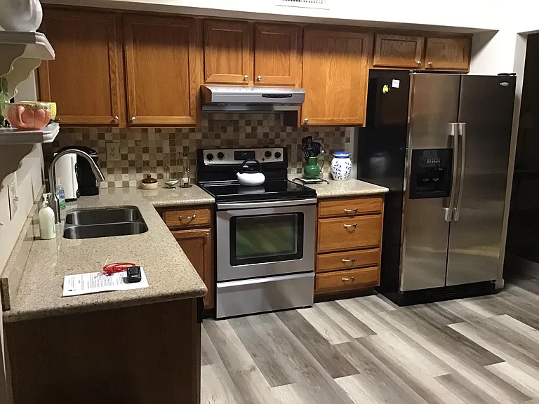 Kitchen with SS appliances and granite counters