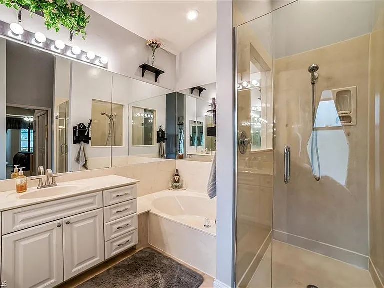 5980 Hidden Oaks Ln — Photo 14