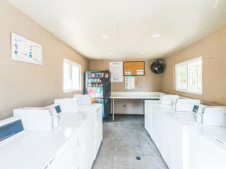 1 of 4 Community Laundry Rooms at Meadow Creek Apartments in San Marcos, CA