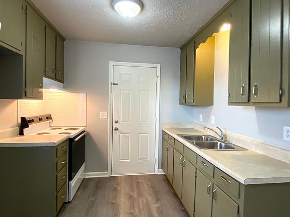 Kitchen: new hood vent and tiled backsplash