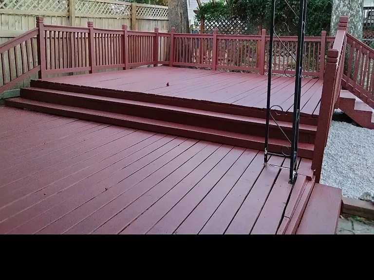 This large deck offers the best of both worlds, with half being covered and the other half being open.
