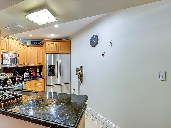 2nd image of 9725 Fontainebleau Blvd #A211